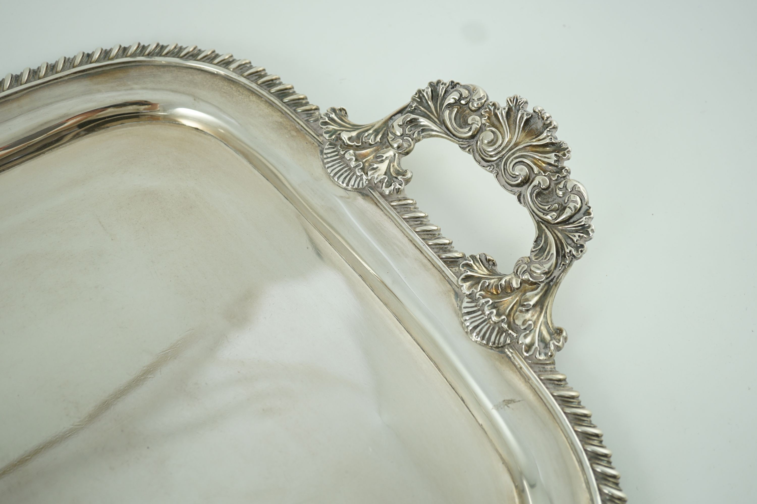 A George IV silver two-handled rounded rectangular tea tray, by The Barnards